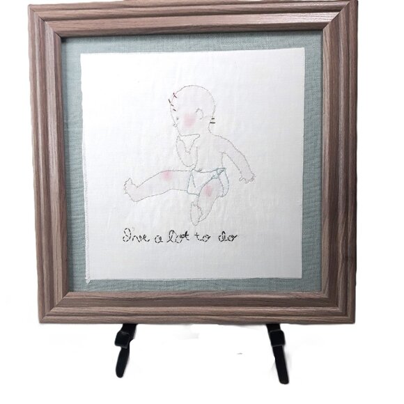 Handmade Embroidered Painting of Baby Titled "I've A Lot To Do" Art Work - Picture 1 of 5